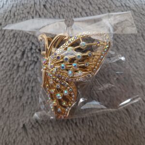 Mariposa metalica con piedras tornasol